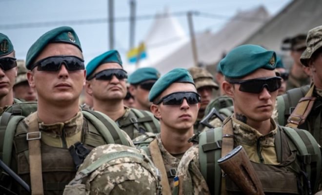 Government Forces and Separatists Withdraw Soldiers to Eastern Ukraine